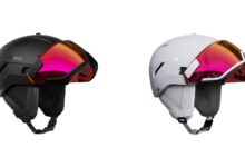 Black and white Atomic Savor GT AMID ski helmets with integrated visors