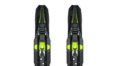 Pair of modern ski bindings with black and neon green accents, designed for winter skiing and snowboarding activities.